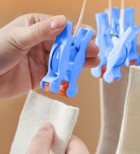 Load image into Gallery viewer, Space-Saving Collapsible Hanger with 19 Clips - Compact Clothes Organizer