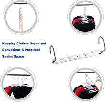 Load image into Gallery viewer, Space saving hanger in use holding multiple garments on a wardrobe rail